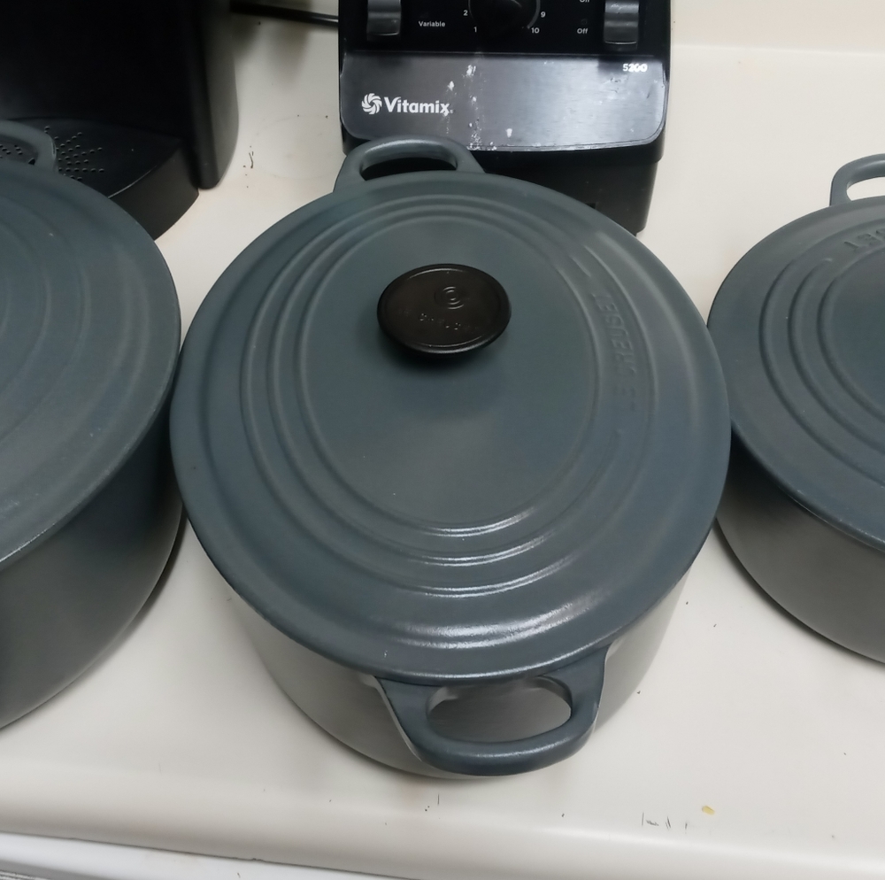 Le Creuset set of three dutch oven